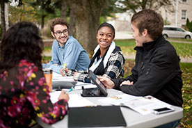 Students studying on campus. Link to What to Give Students studying on campus. Link to What to Give