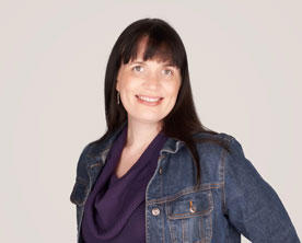 Sarah Valencia ’03. Link to her story
